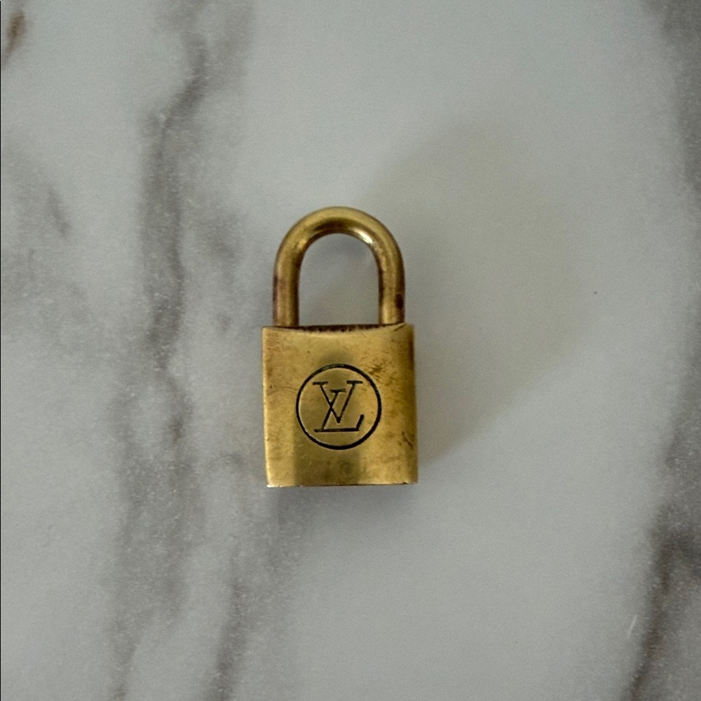 Louis Vuitton Luxurious Gold Lock